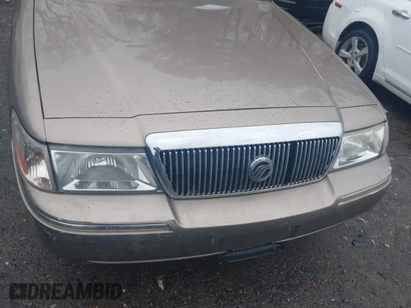 ✅ 2004 Mercury Grand Marquis GS • VIN: 2MEFM74W24X604421 • Lot: 41929099. Wystawiony na IAAI z przebiegiem 200 500 mil. Bezpłatny archiwum sprzedaży aukcyjnych z USA i szczegółowy raport historii pojazdu na DreamBid. Zdjęcie 6.