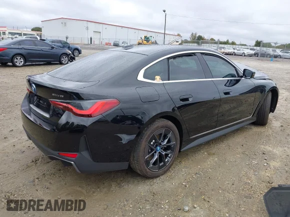✅ 2024 BMW i4 eDrive35 • VIN: WBY43AW02RFS51942 • Лот: 43558844. Опубликован ранее на IAAI с пробегом 17 271 миль. Бесплатный доступ к архиву аукционных продаж из США и подробный отчёт об истории автомобиля на DreamBid. Изображение 4.