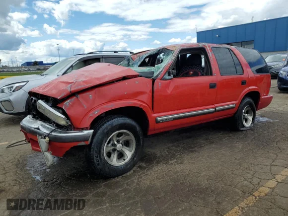 ✅ 2001 Chevrolet Blazer LT • VIN: 1GNCS13W812199664 • Lot: 70147585. Listed on Copart with Not provided. Free auction sales archive from the USA and detailed vehicle history report at DreamBid. Image 1.
