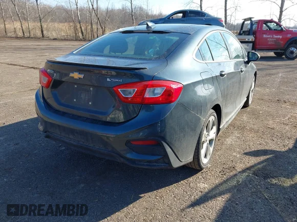 ✅ 2017 Chevrolet Cruze Premier • VIN: 1G1BF5SM1H7217816 • Lot: 44397520. Wystawiony na IAAI z przebiegiem 164 988 mil. Bezpłatny archiwum sprzedaży aukcyjnych z USA i szczegółowy raport historii pojazdu na DreamBid. Zdjęcie 4.