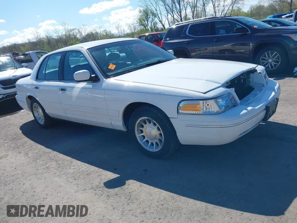 ✅ 1999 Ford Crown Victoria LX • VIN: 2FAFP74W8XX119266 • Lot: 44873039. Listed on IAAI with 166,841 mi. Free auction sales archive from the USA and detailed vehicle history report at DreamBid. Image 1.
