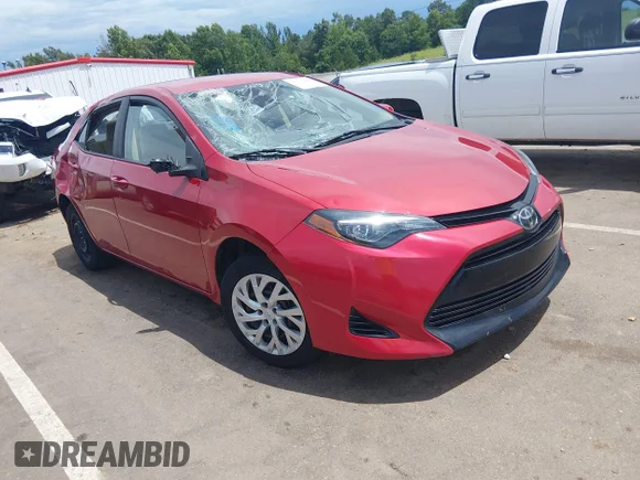 ✅ 2018 Toyota Corolla LE • VIN: 5YFBURHE1JP824985 • Lot: 45434201. Listed on IAAI with 95,586 mi. Free auction sales archive from the USA and detailed vehicle history report at DreamBid. Image 1.