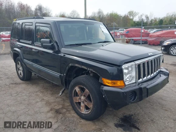 ✅ 2007 Jeep Commander Sport • VIN: 1J8HG48PX7C647465 • Lot: 42119009. Listed on IAAI with 124,938 mi. Free auction sales archive from the USA and detailed vehicle history report at DreamBid. Image 1.