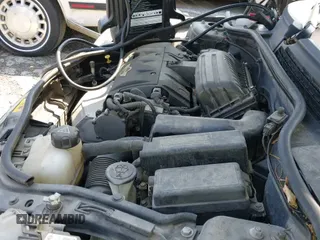 ✅ 2011 MINI Convertible • VIN: WMWZN3C56BT132924 • Lot: 42161363. Listed on IAAI with 133,444 mi. Free auction sales archive from the USA and detailed vehicle history report at DreamBid. Image 12.