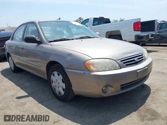 ✅ 2002 Kia Spectra • VIN: KNAFB121225201126 • Лот: 42463258. Опубликован ранее на IAAI с пробегом 89 540 миль. Бесплатный доступ к архиву аукционных продаж из США и подробный отчёт об истории автомобиля на DreamBid. Изображение 1.