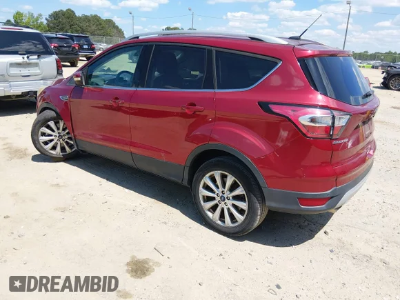 ✅ 2017 Ford Escape Titanium • VIN: 1FMCU0J92HUD34013 • Lot: 45115975. Wystawiony na IAAI z przebiegiem 73 042 mil. Bezpłatny archiwum sprzedaży aukcyjnych z USA i szczegółowy raport historii pojazdu na DreamBid. Zdjęcie 3.