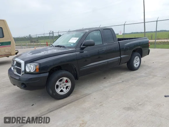 ✅ 2007 Dodge Dakota SLT • VIN: 1D7HE42PX7S159876 • Lot: 42311466. Wystawiony na IAAI z przebiegiem 248 345 mil. Bezpłatny archiwum sprzedaży aukcyjnych z USA i szczegółowy raport historii pojazdu na DreamBid. Zdjęcie 2.