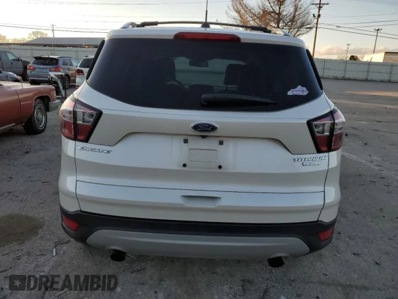 ✅ 2017 Ford Escape Titanium • VIN: 1FMCU0JD5HUC46416 • Лот: 70532872. Опубліковано раніше на Copart з пробігом 112 877 миль. Безкоштовний доступ до архіву аукціонних продажів зі США та докладний звіт про історію автомобіля на DreamBid. Зображення 6.