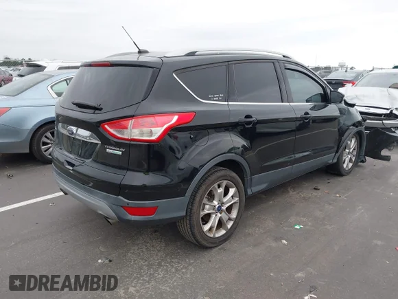 ✅ 2016 Ford Escape Titanium • VIN: 1FMCU0JX6GUB79270 • Lot: 43994340. Listed on IAAI with 103,515 mi. Free auction sales archive from the USA and detailed vehicle history report at DreamBid. Image 4.