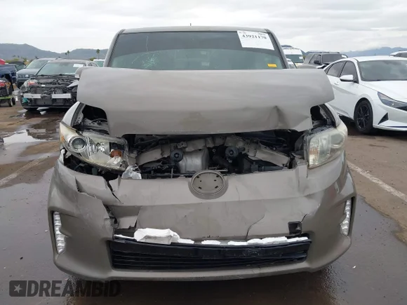 ✅ 2014 Scion xB • VIN: JTLZE4FE9EJ059346 • Lot: 43921170. Listed on IAAI with 130,198 mi. Free auction sales archive from the USA and detailed vehicle history report at DreamBid. Image 6.