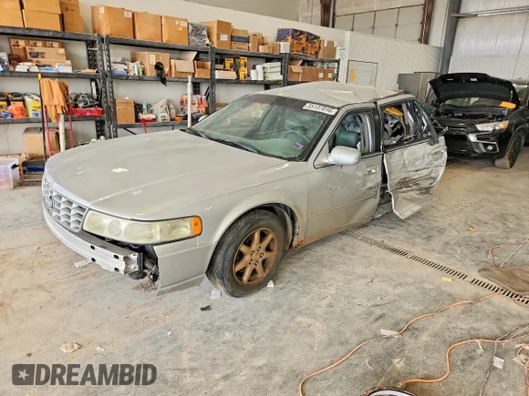 ✅ 2003 Cadillac Seville Luxury SLS • VIN: 1G6KS54Y43U261910 • Lot: 55137016. Listed on Copart with 167,424 mi. Free auction sales archive from the USA and detailed vehicle history report at DreamBid. Image 1.