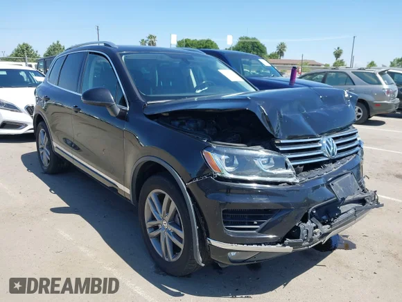 ✅ 2015 Volkswagen Touareg Sport • VIN: WVGEP9BP0FD008015 • Lot: 42180689. Wystawiony na IAAI z przebiegiem 132 115 mil. Bezpłatny archiwum sprzedaży aukcyjnych z USA i szczegółowy raport historii pojazdu na DreamBid. Zdjęcie 1.