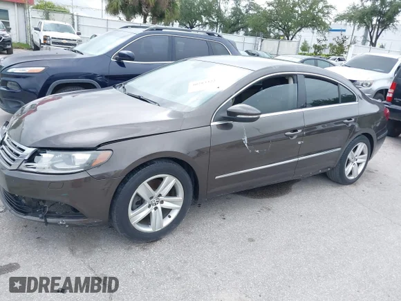 ✅ 2014 Volkswagen CC Sport • VIN: WVWBP7ANXEE530185 • Лот: 41304487. Опубліковано раніше на IAAI з пробігом 166 706 миль. Безкоштовний доступ до архіву аукціонних продажів зі США та докладний звіт про історію автомобіля на DreamBid. Зображення 2.