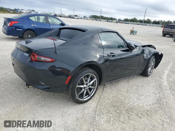 ✅ 2022 Mazda MX-5 Miata Grand Touring • VIN: JM1NDAM74N0506588 • Lot: 39974173. Wystawiony na Copart z przebiegiem 6 367 mil. Bezpłatny archiwum sprzedaży aukcyjnych z USA i szczegółowy raport historii pojazdu na DreamBid. Zdjęcie 3.