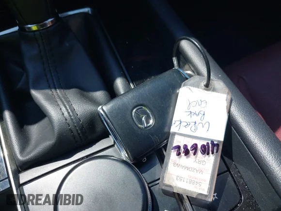 ✅ 2024 Mazda 3 S Carbon Edition • VIN: 3MZBPBCMXRM410682 • Lot: 43049840. Listed on IAAI with 35,423 mi. Free auction sales archive from the USA and detailed vehicle history report at DreamBid. Image 11.