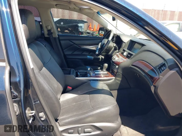 ✅ 2015 Infiniti Q70 • VIN: JN1BY1PP8FM601834 • Lot: 42028330. Wystawiony na IAAI z przebiegiem 106 285 mil. Bezpłatny archiwum sprzedaży aukcyjnych z USA i szczegółowy raport historii pojazdu na DreamBid. Zdjęcie 5.