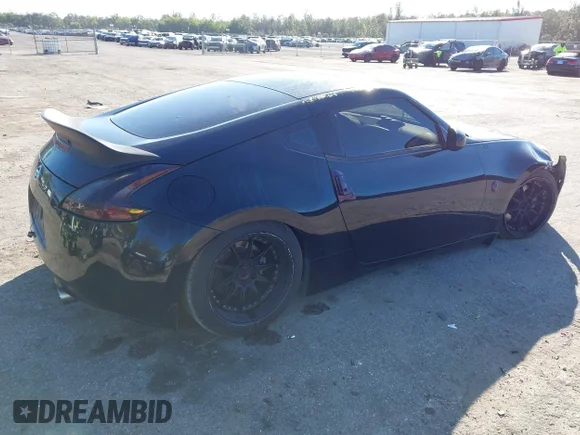 ✅ 2018 Nissan 370Z • VIN: JN1AZ4EH2JM571096 • Lot: 44088504. Wystawiony na IAAI z przebiegiem 128 086 mil. Bezpłatny archiwum sprzedaży aukcyjnych z USA i szczegółowy raport historii pojazdu na DreamBid. Zdjęcie 4.