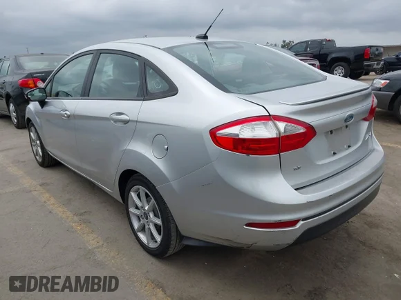 ✅ 2015 Ford Fiesta SE • VIN: 3FADP4BJ3FM129632 • Лот: 45521938. Опубликован ранее на IAAI с пробегом 96 367 миль. Бесплатный доступ к архиву аукционных продаж из США и подробный отчёт об истории автомобиля на DreamBid. Изображение 3.