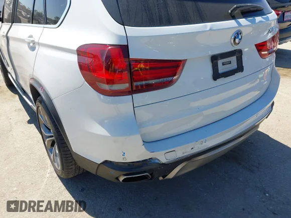 ✅ 2018 BMW X5 xDrive35i • VIN: 5UXKR0C50J0X89403 • Lot: 44580147. Listed on IAAI with 153,825 mi. Free auction sales archive from the USA and detailed vehicle history report at DreamBid. Image 6.
