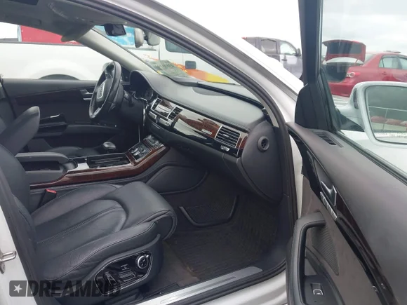 ✅ 2015 Audi A8 4.0T • VIN: WAU32AFD0FN001715 • Лот: 43016193. Опубліковано раніше на IAAI з пробігом 169 177 миль. Безкоштовний доступ до архіву аукціонних продажів зі США та докладний звіт про історію автомобіля на DreamBid. Зображення 5.