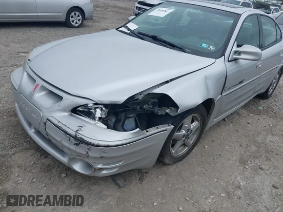 ✅ 2001 Pontiac Grand Am GT1 • VIN: 1G2NV52E11C280089 • Lot: 42456267. Wystawiony na IAAI z przebiegiem 109 748 mil. Bezpłatny archiwum sprzedaży aukcyjnych z USA i szczegółowy raport historii pojazdu na DreamBid. Zdjęcie 6.