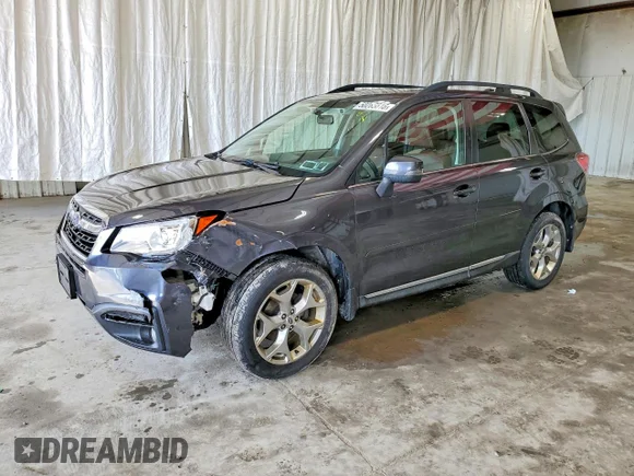 ✅ 2017 Subaru Forester Touring • VIN: JF2SJAWC2HH590598 • Лот: 50285816. Опубликован ранее на Copart с пробегом 119 149 миль. Бесплатный доступ к архиву аукционных продаж из США и подробный отчёт об истории автомобиля на DreamBid. Изображение 1.