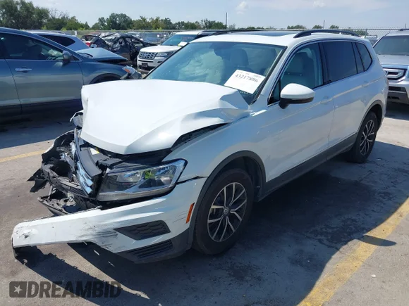✅ 2021 Volkswagen Tiguan SE • VIN: 3VV3B7AXXMM089009 • Lot: 43217896. Wystawiony na IAAI z przebiegiem 49 638 mil. Bezpłatny archiwum sprzedaży aukcyjnych z USA i szczegółowy raport historii pojazdu na DreamBid. Zdjęcie 2.
