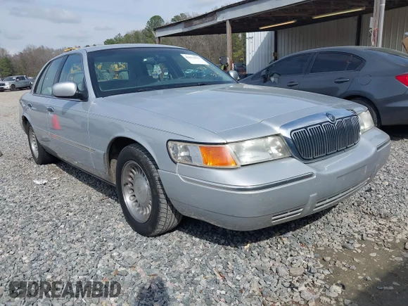 ✅ 2000 Mercury Grand Marquis LS • VIN: 2MEFM75WXYX716193 • Lot: 41814919. Wystawiony na IAAI z przebiegiem 120 338 mil. Bezpłatny archiwum sprzedaży aukcyjnych z USA i szczegółowy raport historii pojazdu na DreamBid. Zdjęcie 1.