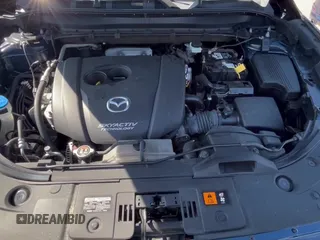 ✅ 2019 Mazda CX-5 Grand Touring • VIN: JM3KFADM0K1523596 • Lot: 94179255. Wystawiony na Copart z przebiegiem 128 421 mil. Bezpłatny archiwum sprzedaży aukcyjnych z USA i szczegółowy raport historii pojazdu na DreamBid. Zdjęcie 11.