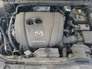 ✅ 2021 Mazda CX-5 Touring • VIN: JM3KFBCM2M1499585 • Lot: 54876185. Wystawiony na Copart z przebiegiem 57 704 mil. Bezpłatny archiwum sprzedaży aukcyjnych z USA i szczegółowy raport historii pojazdu na DreamBid. Zdjęcie 13.