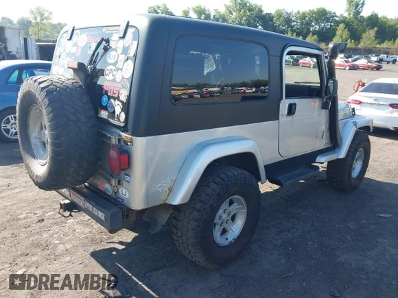 ✅ 2005 Jeep Wrangler Unlimited • VIN: 1J4FA44S55P352803 • Лот: 42688284. Опубликован ранее на IAAI с пробегом 128 586 миль. Бесплатный доступ к архиву аукционных продаж из США и подробный отчёт об истории автомобиля на DreamBid. Изображение 4.