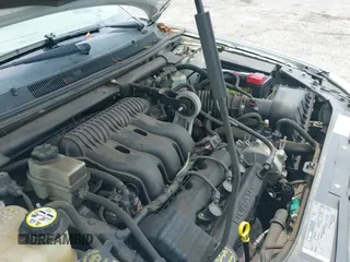 ✅ 2006 Mercury Montego Luxury • VIN: 1MEFM40126G618871 • Лот: 42202697. Опубликован ранее на IAAI с пробегом 106 176 миль. Бесплатный доступ к архиву аукционных продаж из США и подробный отчёт об истории автомобиля на DreamBid. Изображение 13.