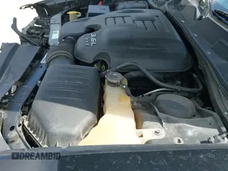 ✅ 2014 Dodge Challenger SXT • VIN: 2C3CDYAG9EH136646 • Lot: 42542559. Listed on IAAI with 169,334 mi. Free auction sales archive from the USA and detailed vehicle history report at DreamBid. Image 25.