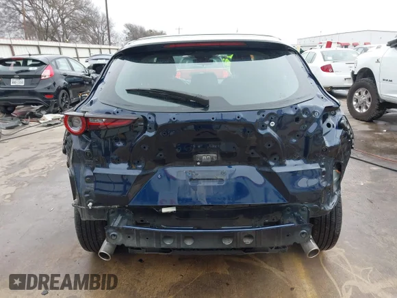 ✅ 2023 Mazda CX-30 S • VIN: 3MVDMBAM1PM533998 • Lot: 44213904. Listed on IAAI with 57,671 mi. Free auction sales archive from the USA and detailed vehicle history report at DreamBid. Image 6.