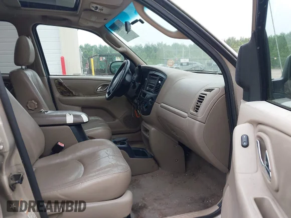 ✅ 2002 Mazda Tribute LX • VIN: 4F2CU09112KM28471 • Lot: 42500683. Wystawiony na IAAI z przebiegiem 150 298 mil. Bezpłatny archiwum sprzedaży aukcyjnych z USA i szczegółowy raport historii pojazdu na DreamBid. Zdjęcie 5.