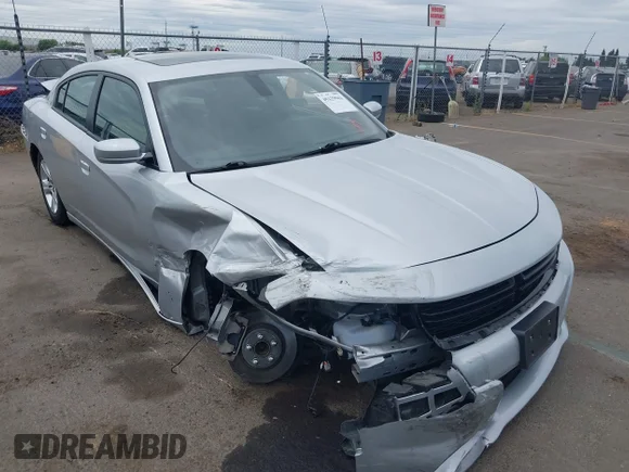 ✅ 2022 Dodge Charger SXT • VIN: 2C3CDXBGXNH201660 • Lot: 45329563. Listed on IAAI with 72,874 mi. Free auction sales archive from the USA and detailed vehicle history report at DreamBid. Image 1.