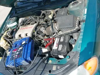 ✅ 1999 Pontiac Grand Am SE1 • VIN: 1G2NE52E0XC574219 • Lot: 42824816. Wystawiony na IAAI z przebiegiem 192 748 mil. Bezpłatny archiwum sprzedaży aukcyjnych z USA i szczegółowy raport historii pojazdu na DreamBid. Zdjęcie 15.