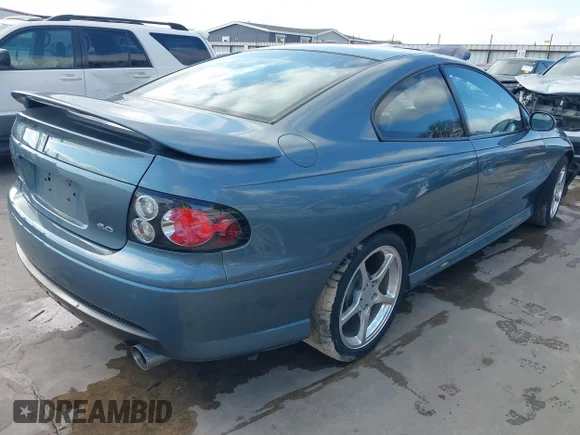 ✅ 2006 Pontiac GTO • VIN: 6G2VX12UX6L561098 • Lot: 41487635. Wystawiony na IAAI z przebiegiem 69 741 mil. Bezpłatny archiwum sprzedaży aukcyjnych z USA i szczegółowy raport historii pojazdu na DreamBid. Zdjęcie 4.