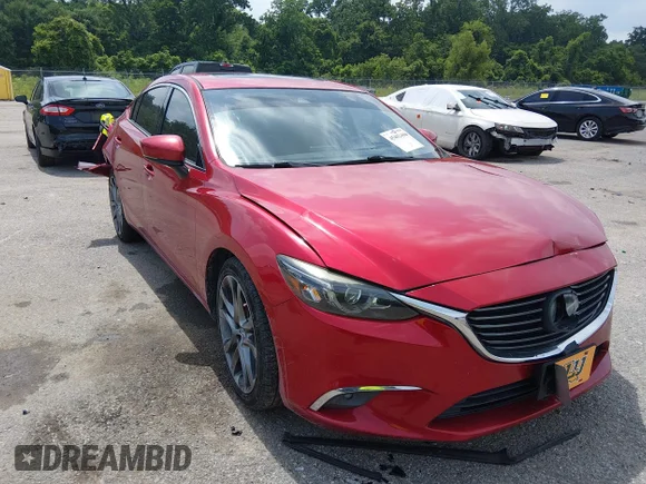 ✅ 2017 Mazda 6 Grand Touring • VIN: JM1GL1X53H1116084 • Lot: 45402486. Wystawiony na IAAI z przebiegiem 130 880 mil. Bezpłatny archiwum sprzedaży aukcyjnych z USA i szczegółowy raport historii pojazdu na DreamBid. Zdjęcie 1.