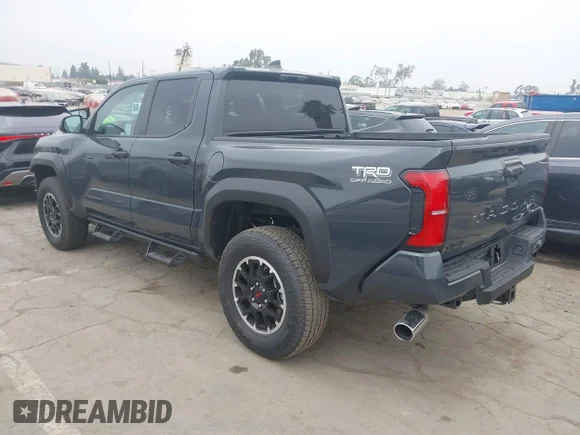 ✅ 2025 Toyota Tacoma TRD Sport Hybrid • VIN: 3TYLC5LN1ST032114 • Lot: 43087293. Listed on IAAI with 1,511 mi. Free auction sales archive from the USA and detailed vehicle history report at DreamBid. Image 3.