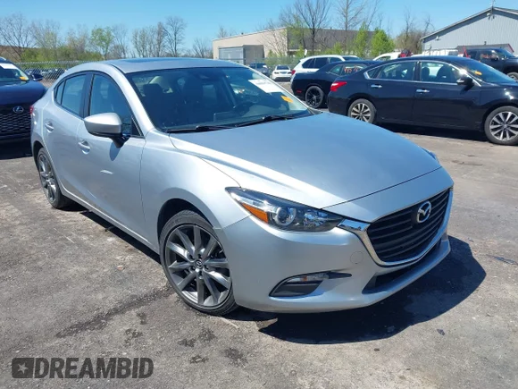 ✅ 2018 Mazda 3 Touring • VIN: 3MZBN1V36JM217082 • Лот: 44899788. Опубликован ранее на IAAI с пробегом 92 674 миль. Бесплатный доступ к архиву аукционных продаж из США и подробный отчёт об истории автомобиля на DreamBid. Изображение 1.