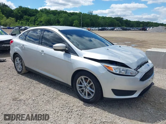 ✅ 2018 Ford Focus SE • VIN: 1FADP3F25JL288451 • Lot: 45371610. Wystawiony na IAAI z przebiegiem 90 203 mil. Bezpłatny archiwum sprzedaży aukcyjnych z USA i szczegółowy raport historii pojazdu na DreamBid. Zdjęcie 1.
