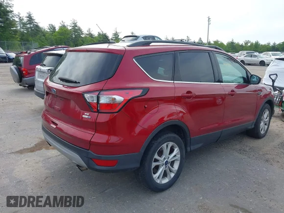 ✅ 2018 Ford Escape SE • VIN: 1FMCU9GD2JUB54925 • Lot: 45142763. Listed on IAAI with 108,498 mi. Free auction sales archive from the USA and detailed vehicle history report at DreamBid. Image 4.