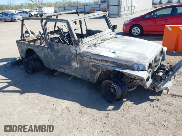 ✅ 2005 Jeep Wrangler Unlimited • VIN: 1J4FA44S55P366393 • Lot: 41849008. Listed on IAAI with Not provided. Free auction sales archive from the USA and detailed vehicle history report at DreamBid. Image 1.
