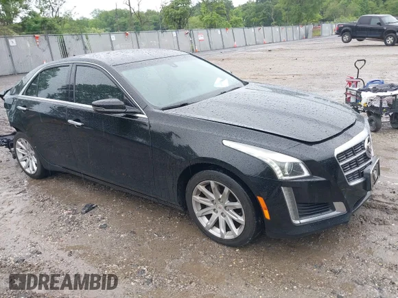 ✅ 2014 Cadillac CTS AWD • VIN: 1G6AW5SX4E0129136 • Lot: 42364098. Wystawiony na IAAI z przebiegiem 137 080 mil. Bezpłatny archiwum sprzedaży aukcyjnych z USA i szczegółowy raport historii pojazdu na DreamBid. Zdjęcie 1.