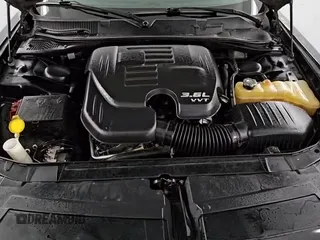 ✅ 2016 Dodge Challenger SXT Plus • VIN: 2C3CDZAG0GH329714 • Lot: 68774845. Wystawiony na Copart z przebiegiem 161 659 mil. Bezpłatny archiwum sprzedaży aukcyjnych z USA i szczegółowy raport historii pojazdu na DreamBid. Zdjęcie 14.