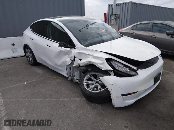 ✅ 2022 Tesla Model Y Long Range • VIN: 7SAYGDEE9NF336655 • Lot: 45110608. Listed on IAAI with 65,832 mi. Free auction sales archive from the USA and detailed vehicle history report at DreamBid. Image 1.