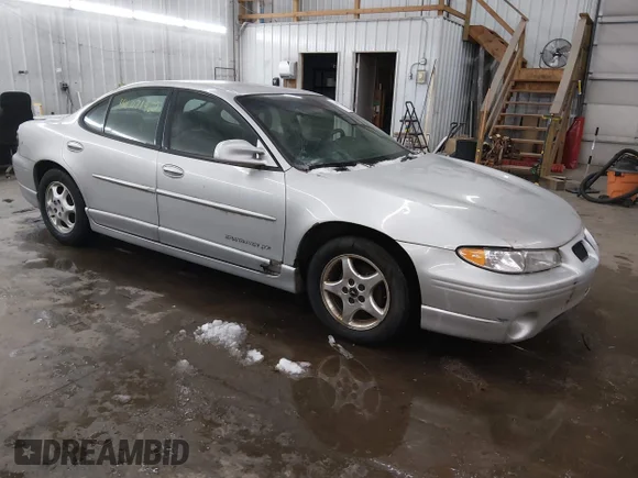 ✅ 2003 Pontiac Grand Prix GT • VIN: 1G2WP52K73F180343 • Lot: 44071960. Wystawiony na IAAI z przebiegiem 188 315 mil. Bezpłatny archiwum sprzedaży aukcyjnych z USA i szczegółowy raport historii pojazdu na DreamBid. Zdjęcie 1.