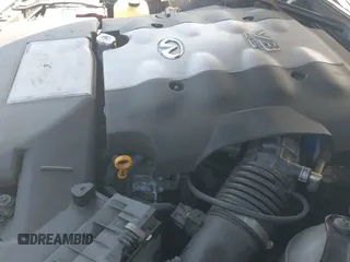 ✅ 2003 Infiniti M • VIN: JNKAY41E23M004898 • Lot: 41510094. Listed on IAAI with 216,918 mi. Free auction sales archive from the USA and detailed vehicle history report at DreamBid. Image 13.