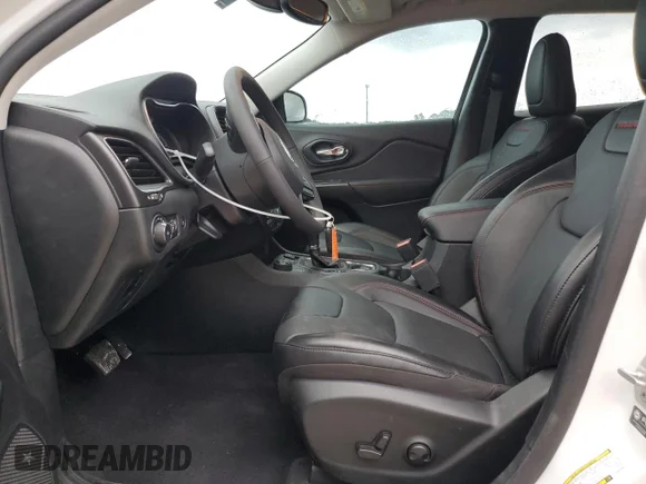 ✅ 2022 Jeep Cherokee Trailhawk • VIN: 1C4PJMBX9ND549192 • Лот: 76135573. Опубликован ранее на Copart с пробегом 10 011 миль. Бесплатный доступ к архиву аукционных продаж из США и подробный отчёт об истории автомобиля на DreamBid. Изображение 7.